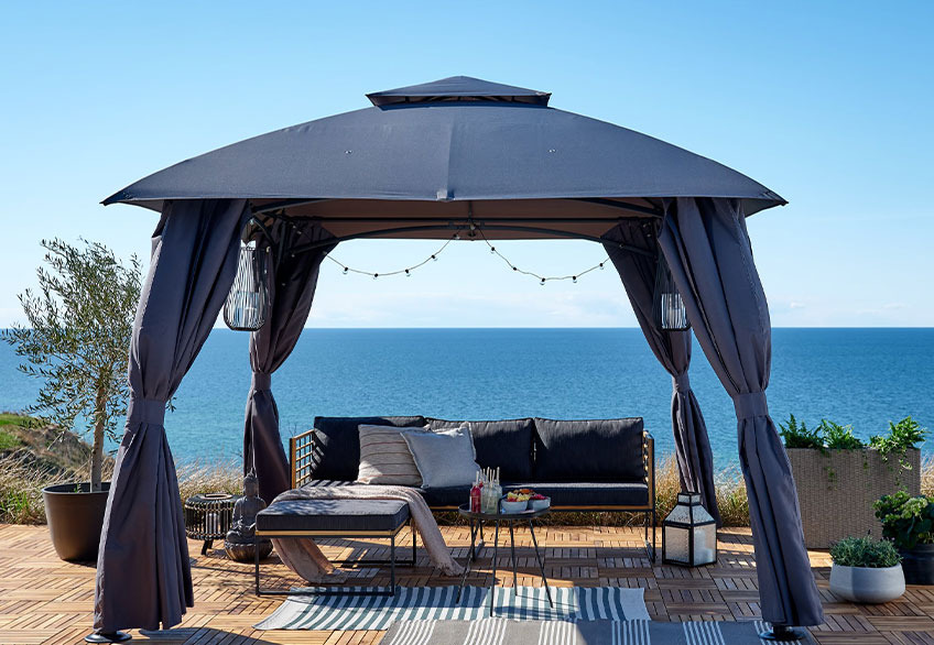 Outdoor gazebo on a patio by the ocean 