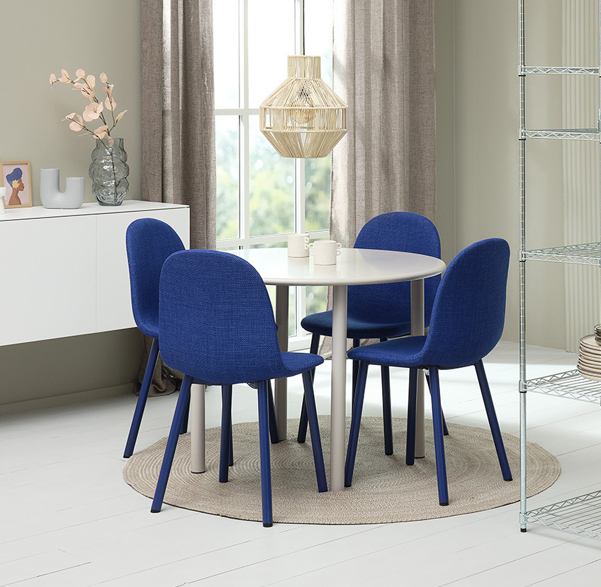 Cobalt blue dining chair and round dining table in white 