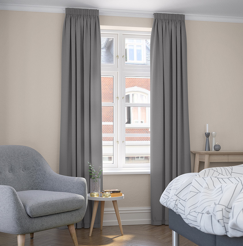 Grey dimming curtains in bedroom 