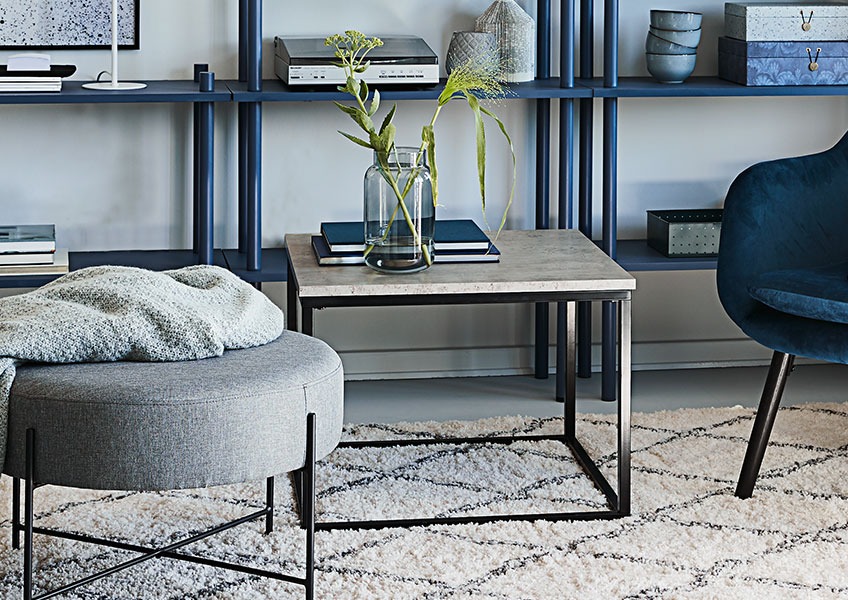 DOKKEDAL end table and PADBORG pouffe in front of TEGLUM bookcase Living room with end table and pouffe in front of a bookcase
