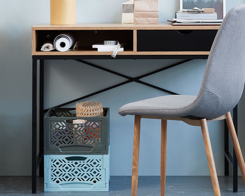 Desk with storage solutions under the table top