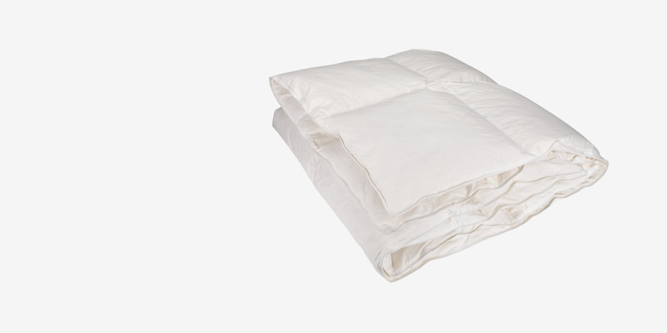 Folded white duvet with a quilted box pattern, shown against a plain light grey background.